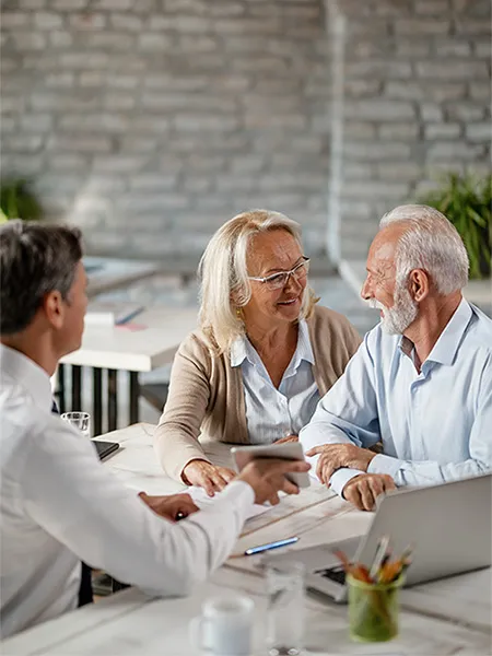 seniors with insurance agent